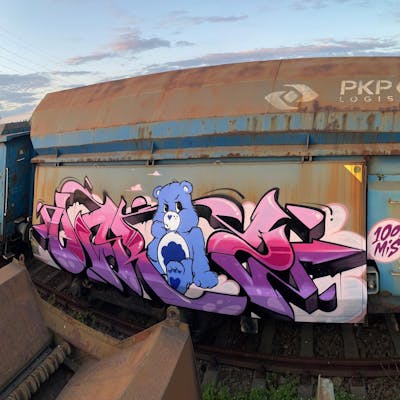 Coralle and Violet Stylewriting by Ogryz. This Graffiti is located in Poland and was created in 2022. This Graffiti can be described as Stylewriting, Characters, Trains and Freights.