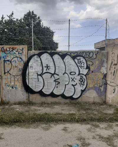 White and Black Throw Up by CEAR.ONE. This Graffiti is located in Italy and was created in 2023.