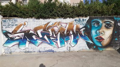 Brown and Blue Stylewriting by serman. This Graffiti is located in Ambelonas, Greece and was created in 2021. This Graffiti can be described as Stylewriting and Characters.