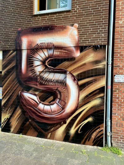 Brown and Beige Streetart by LScrew and spliff one. This Graffiti is located in Kiel, Germany and was created in 2022. This Graffiti can be described as Streetart and Murals.