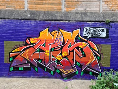 Orange and Colorful Stylewriting by DPC, TWO, Aisone and WC. This Graffiti is located in Leicester, United Kingdom and was created in 2024.