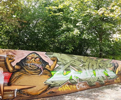 Beige and Colorful Stylewriting by Riots and Kasimir. This Graffiti is located in Dresden, Germany and was created in 2022. This Graffiti can be described as Stylewriting, Characters and Wall of Fame.