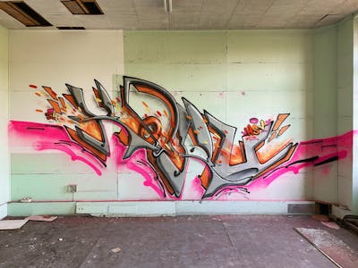 Grey and Coralle and Orange Stylewriting by Ketru. This Graffiti is located in France and was created in 2024. This Graffiti can be described as Stylewriting and Abandoned.