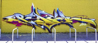 Yellow and Coralle and Blue Stylewriting by Syck, ABS, KKP and Los Capitanos. This Graffiti is located in Oldenburg, Germany and was created in 2023.