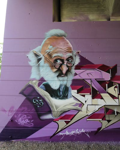 Colorful and Violet Characters by CUORE. This Graffiti is located in Ludwigsfelde, Germany and was created in 2023. This Graffiti can be described as Characters and Wall of Fame.