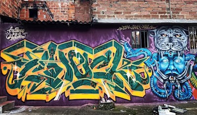 Colorful and Yellow Stylewriting by Check91_. This Graffiti is located in Comuna 13, Colombia and was created in 2022. This Graffiti can be described as Stylewriting and Characters.