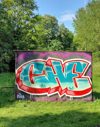 Cyan and Red and Colorful Stylewriting by CHE. This Graffiti is located in Herzogenrath, Germany and was created in 2023.