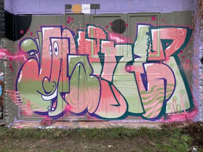 Coralle and Light Green Stylewriting by Gauner. This Graffiti is located in Germany and was created in 2021. This Graffiti can be described as Stylewriting and Characters.