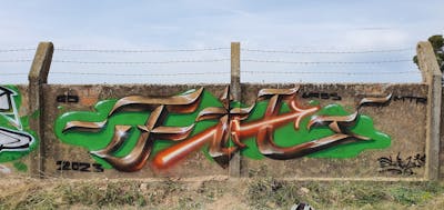 Brown and Orange and Light Green Stylewriting by fil, urbansoldierz, graffdinamics and mtrclan. This Graffiti is located in Lleida, Spain and was created in 2023.