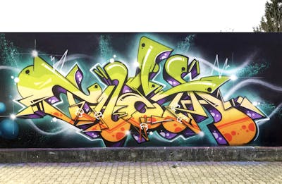 Colorful and Light Green Stylewriting by Mister Clay and Theta. This Graffiti is located in Italy and was created in 2017.