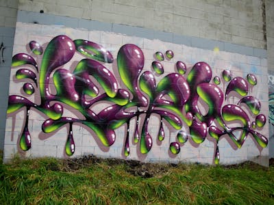 Light Green and Violet Stylewriting by Kezam. This Graffiti is located in Auckland, New Zealand and was created in 2022. This Graffiti can be described as Stylewriting, 3D and Abandoned.