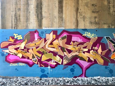 Colorful and Violet and Light Blue Stylewriting by Crude. This Graffiti is located in Bangkok, Thailand and was created in 2021.