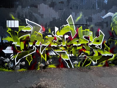 Light Green and Grey Stylewriting by omseg. This Graffiti is located in Lörrach, Germany and was created in 2022.