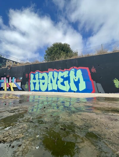 Light Green and Light Blue and Red Stylewriting by Hanem. This Graffiti is located in Valencia, Spain and was created in 2023. This Graffiti can be described as Stylewriting and Wall of Fame.