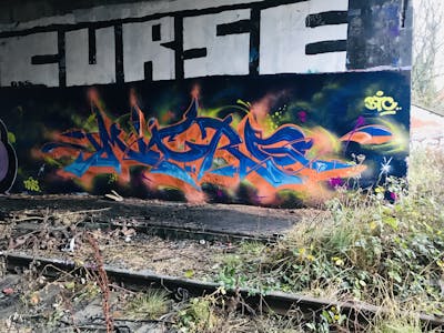 Orange and Blue Abandoned by Micro79. This Graffiti is located in United Kingdom and was created in 2020. This Graffiti can be described as Abandoned and Stylewriting.