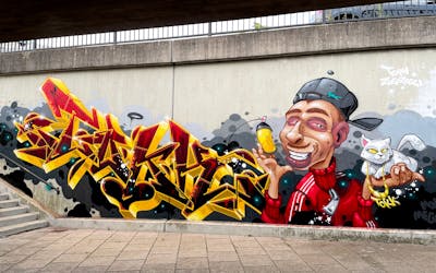 Red and Yellow Characters by Tokk and Amen. This Graffiti is located in Bremen, Germany and was created in 2022. This Graffiti can be described as Characters and Stylewriting.
