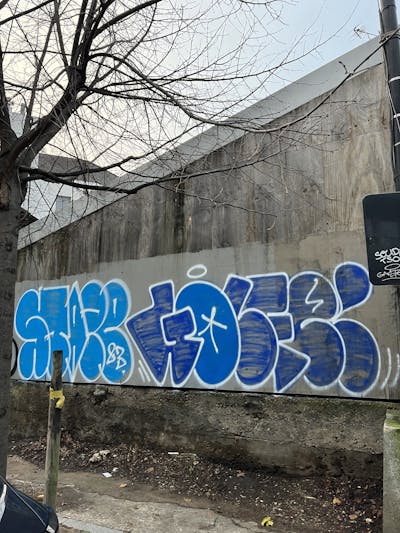 Light Blue and White Throw Up by Golf. This Graffiti is located in France and was created in 2023.