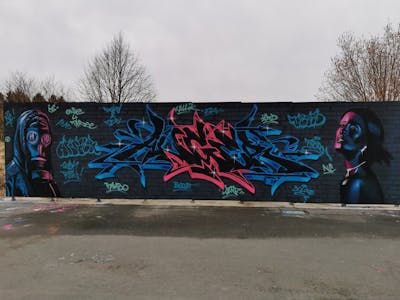 Blue and Red Stylewriting by ANGER. This Graffiti is located in Germany and was created in 2022. This Graffiti can be described as Stylewriting, Characters and Wall of Fame.