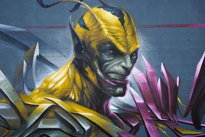 Grey and Yellow and Violet Characters by Spektrum. This Graffiti is located in Berlin, Germany and was created in 2023. This Graffiti can be described as Characters and 3D.