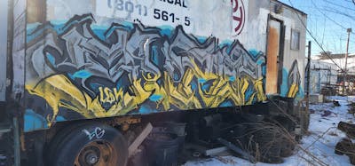Grey and Yellow Stylewriting by Super. This Graffiti is located in United States and was created in 2023. This Graffiti can be described as Stylewriting and Cars.