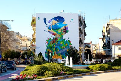 Colorful Characters by Epsilon. This Graffiti is located in Trikala, Greece and was created in 2022. This Graffiti can be described as Characters, Streetart and Murals.