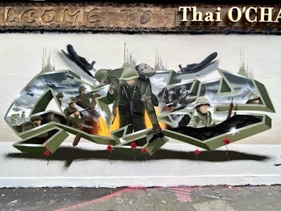 Green and Grey Stylewriting by Only E1. This Graffiti is located in London, United Kingdom and was created in 2021. This Graffiti can be described as Stylewriting, Characters, 3D and Wall of Fame.