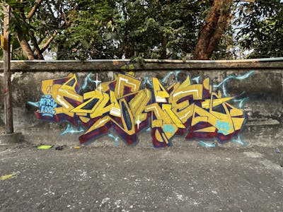 Yellow Stylewriting by Rush One. This Graffiti is located in Yangon city, Myanmar and was created in 2024.
