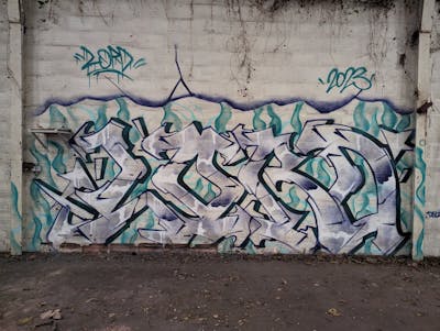 Violet and Cyan Stylewriting by LORD. This Graffiti is located in Caen, France and was created in 2023. This Graffiti can be described as Stylewriting and Abandoned.