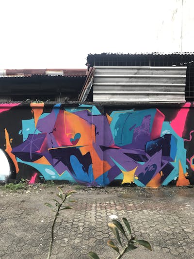 Cyan and Violet and Orange Stylewriting by Note2. This Graffiti is located in Indonesia and was created in 2022. This Graffiti can be described as Stylewriting and Futuristic.