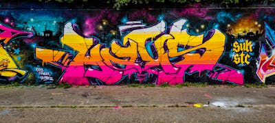 Colorful Stylewriting by HAUS and STC. This Graffiti is located in Neuss, Germany and was created in 2022. This Graffiti can be described as Stylewriting and Wall of Fame.