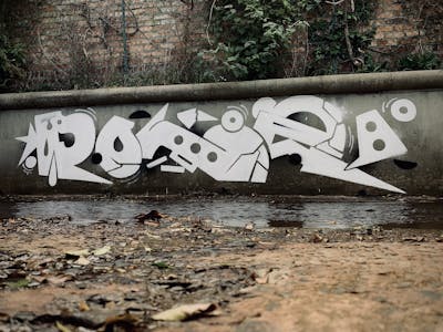 White Stylewriting by Polizei. This Graffiti is located in Cape Town, South Africa and was created in 2021.