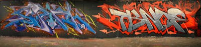 Blue and Grey and Red Stylewriting by Chips and Tkno. This Graffiti is located in London, United Kingdom and was created in 2021. This Graffiti can be described as Stylewriting and Wall of Fame.