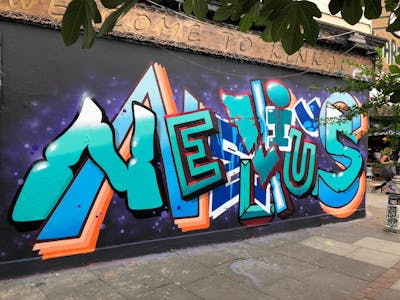 Colorful and Cyan Stylewriting by Nelius and smo__crew. This Graffiti is located in London, United Kingdom and was created in 2020. This Graffiti can be described as Stylewriting and Wall of Fame.