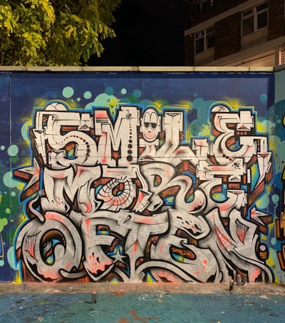 Chrome and Colorful Stylewriting by Sorez and smo__crew. This Graffiti is located in London, United Kingdom and was created in 2023.