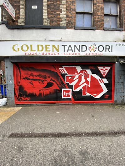Red Characters by Hyro and TETSUO. This Graffiti is located in Manchester, United Kingdom and was created in 2024. This Graffiti can be described as Characters, Stylewriting and Streetart.