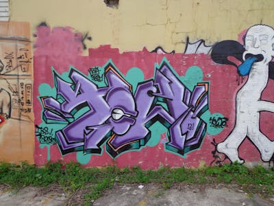 Violet and Colorful Stylewriting by towe. This Graffiti is located in San Juan, Puerto Rico and was created in 2012.
