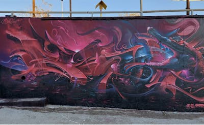 Red and Blue Stylewriting by Bublegum. This Graffiti is located in Barcelona, Spain and was created in 2021. This Graffiti can be described as Stylewriting, Characters and 3D.