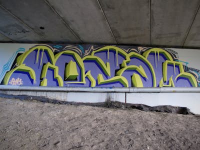 Violet and Yellow Stylewriting by Kezam. This Graffiti is located in Auckland, New Zealand and was created in 2024. This Graffiti can be described as Stylewriting and 3D.