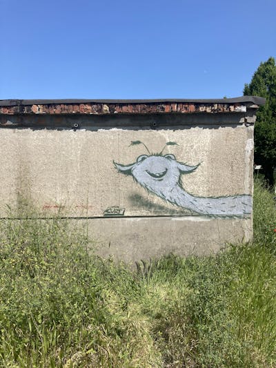 Grey Characters by Curt. This Graffiti is located in Köthen, Germany and was created in 2023. This Graffiti can be described as Characters and Abandoned.
