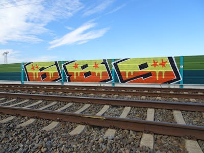 Orange and Yellow Stylewriting by 689 and 689ers. This Graffiti is located in Großenhain, Germany and was created in 2022. This Graffiti can be described as Stylewriting and Line Bombing.