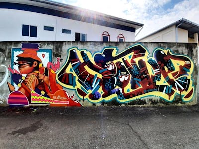 Colorful Stylewriting by Hootive, DOD crew and TMC. This Graffiti is located in SAKON NAKHON, Thailand and was created in 2022. This Graffiti can be described as Stylewriting and Characters.