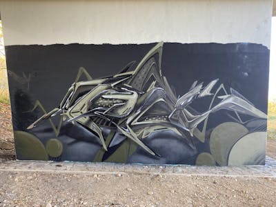 Grey and Beige Stylewriting by Real143 and 143Crew. This Graffiti is located in Most, Czech Republic and was created in 2022. This Graffiti can be described as Stylewriting and Wall of Fame.