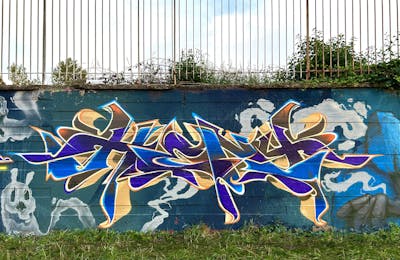 Blue and Light Blue and Beige Stylewriting by Heny. This Graffiti is located in Firenze, Italy and was created in 2023.