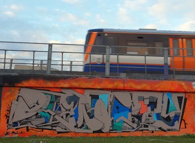 Brown and Orange Stylewriting by REALiTY and Neist. This Graffiti is located in London, United Kingdom and was created in 2019. This Graffiti can be described as Stylewriting and Wall of Fame.
