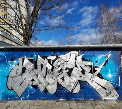 Chrome and Blue and Light Blue Stylewriting by Fems173. This Graffiti is located in lublin, Poland and was created in 2023. This Graffiti can be described as Stylewriting and Characters.