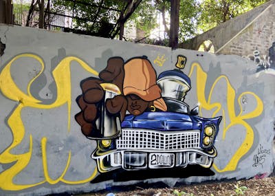 Yellow and Colorful Characters by Mons and TWDC. This Graffiti is located in Bangkok, Thailand and was created in 2022. This Graffiti can be described as Characters, Handstyles and Wall of Fame.