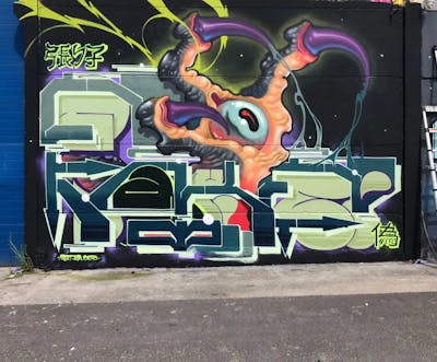 Colorful Stylewriting by Mache and FakeR. This Graffiti is located in Mons, Belgium and was created in 2023. This Graffiti can be described as Stylewriting and Characters.
