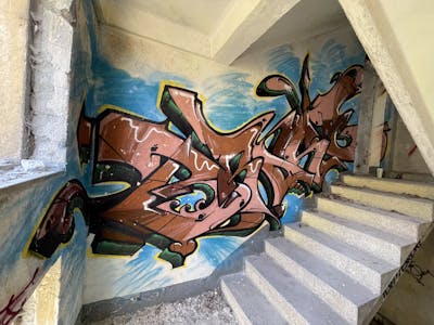 Brown and Colorful Stylewriting by BROKE420. This Graffiti is located in Magdeburg, Germany and was created in 2024. This Graffiti can be described as Stylewriting and Abandoned.