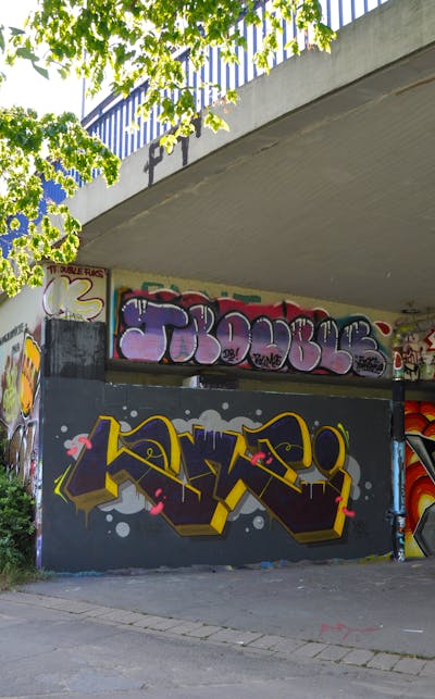 Yellow and Grey Stylewriting by HAMPI and Trouble. This Graffiti is located in Rheine, Germany and was created in 2023. This Graffiti can be described as Stylewriting and Wall of Fame.