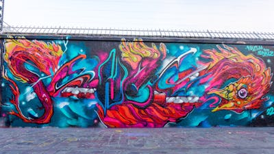 Colorful Stylewriting by SNUZ and nush. This Graffiti is located in Paris, France and was created in 2022. This Graffiti can be described as Stylewriting, Characters and Wall of Fame.